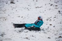 Iran, North Khorasan province, Mahnan village near Bojnourd Families Sliding on Snow 01