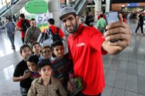 Basketball William Jones Cup 2015 Iran Champion - Haddadi selfie with fans at airport on return