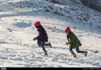 Winter joys - Snow sliding in Iran (Photo credit: Samad Kourdi, ISNA)