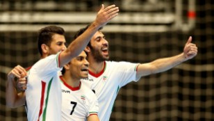 Ali Hassan Zadeh of Iran (C) celebrates his goal with team mates during the semi-final match between Iran and Russia at the FIFA Futsal World Cup in Colombia. (Photo by Jan Kruger - FIFA via Getty Images)