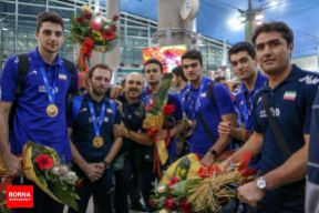 Iranian team welcomed at the airport in Tehran. Photo credit BORNA