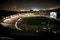 Iranian fans watching the match in Azadi Stadium, Tehran. Photo credit: Mohammad Mohsenifar, MEHR News Agency.