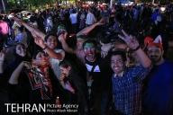 Iranian fans celebrating the victory of their team at Tajrish Square in Tehran. Photo credit: Atiyeh Niknam, Tehran Picture Agency.