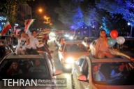 Iranian fans celebrating the victory of their team in Tehran. Photo credit: Shayan Mehrabi, Tehran Picture Agency.