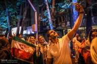Iranian fans celebrating the victory of their team in Tehran. Photo credit: Majid Asgaripour, MEHR News Agency.