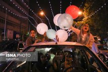 Iranian fans celebrating the victory of their team in Tehran. Photo credit: Hemmat Khahi, ISNA.